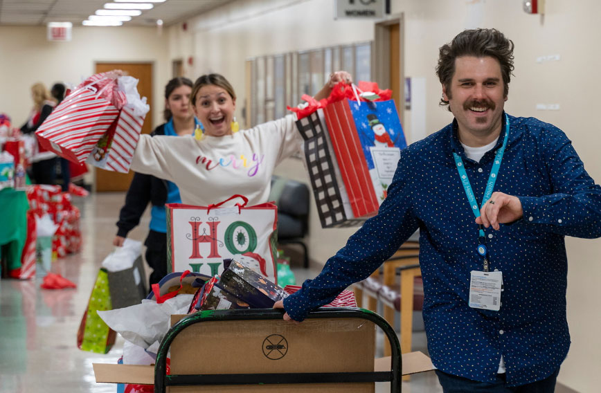 Photo of Marketing Team volenteering at toy drive