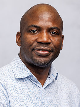 Headshot of Boman Bognet, Staff Chaplain, Spiritual Care
